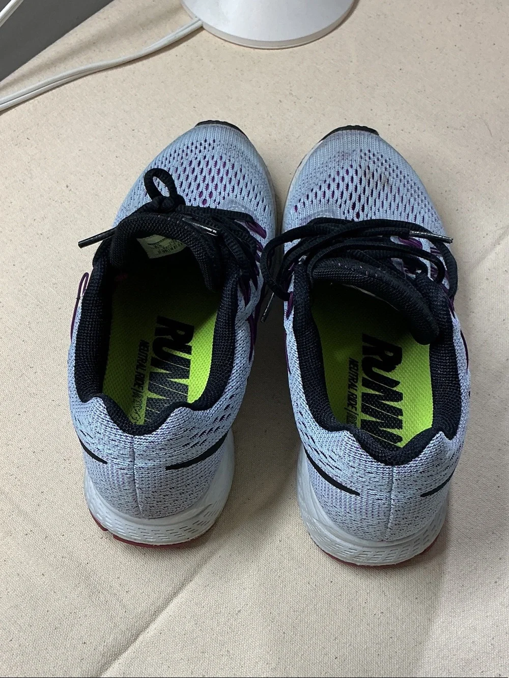 Nike Women's running Shoes in Light Blue with Purple Accents